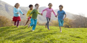 Group of children running together